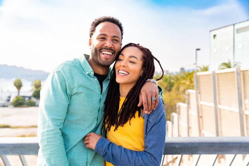 happy-couple-embrace-on-a-bridge-2026-01-07-06-40-02-utc