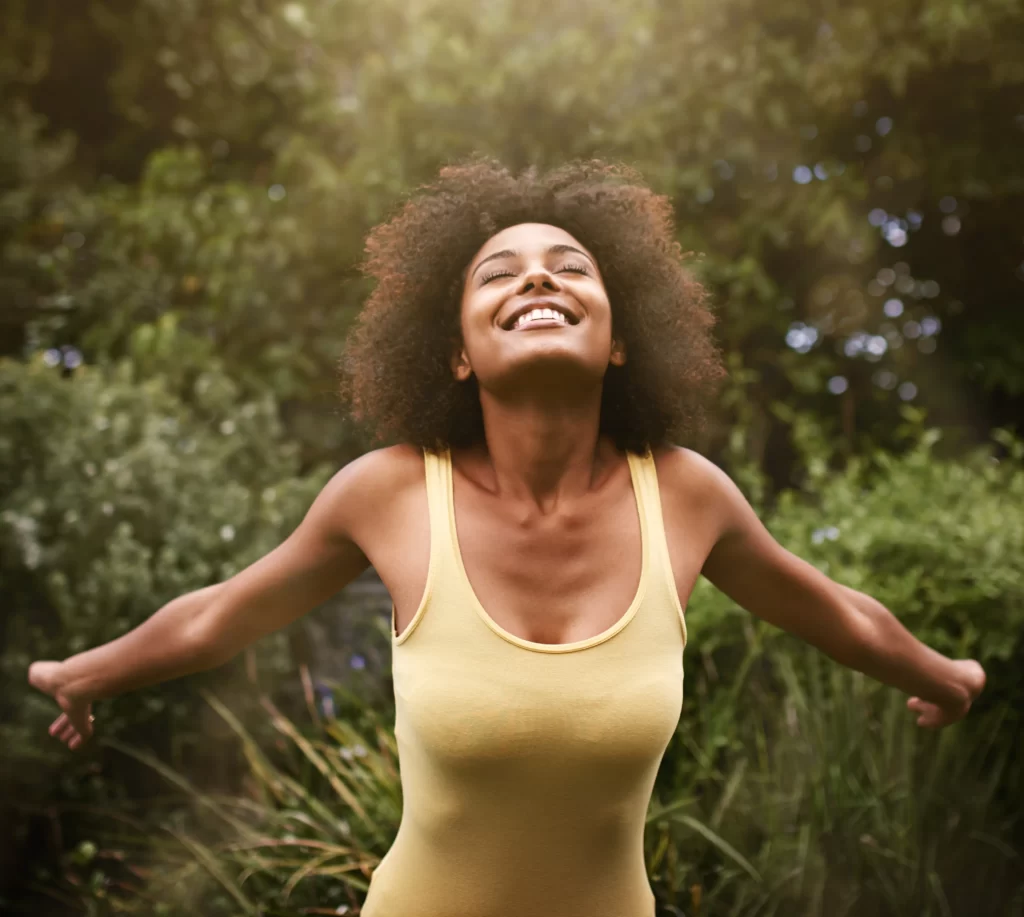 woman-enjoying-fresh-air-in-a-green-park-2026-03-25-03-26-32-utc